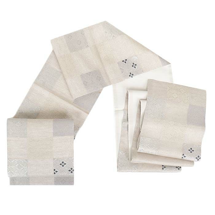 結婚式の黒留袖色留袖や訪問着に合わせたい仕立て上がり袋帯。入学式やお宮参り七五三参り等お子様の行事の礼装にも最適。フォーマルな着物を上品に装う袋帯。